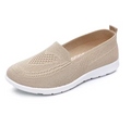 Scarpa slip-on beige in maglia con suola bianca, vista laterale