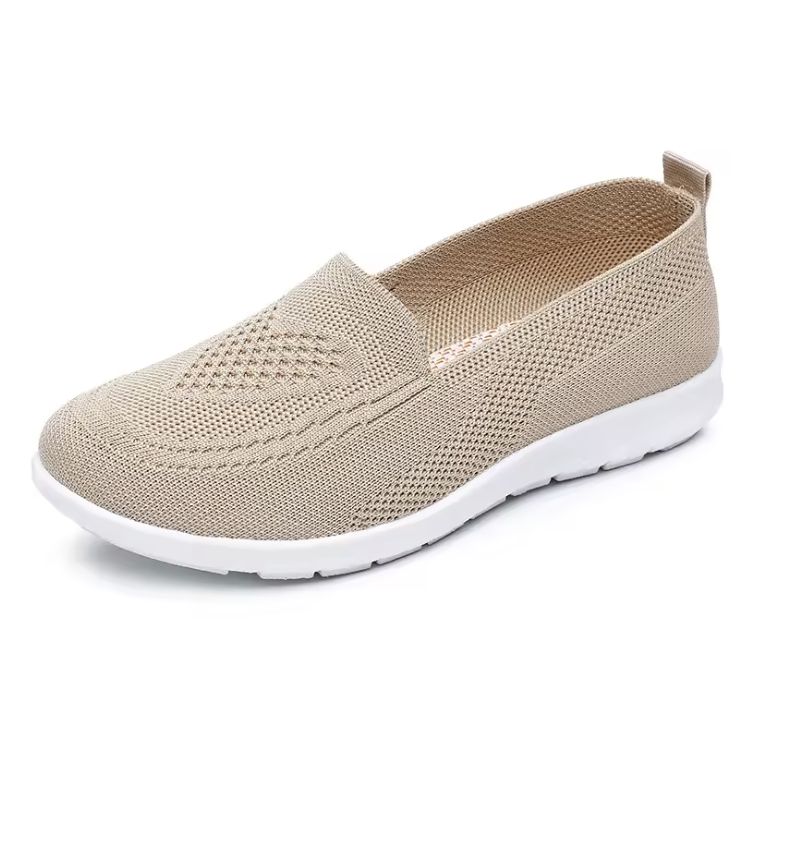 Scarpa slip-on beige in maglia con suola bianca, vista laterale