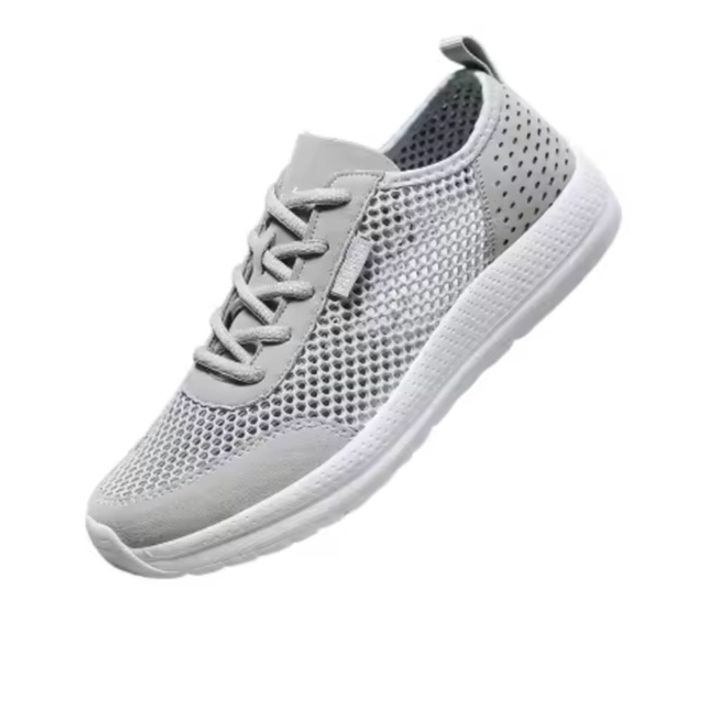 Sneakers uomo grigie in mesh traforato con lacci e suola chiara